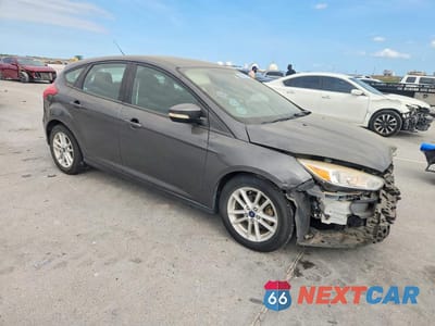 Czwarte zdjęcie samochodu z boku: 2017 FORD FOCUS SE VIN:1FADP3K28HL259574 - miniatura