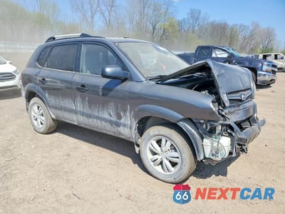 Czwarte zdjęcie samochodu z boku: 2009 HYUNDAI TUCSON GLS VIN:KM8JM12B89U128002 - miniatura