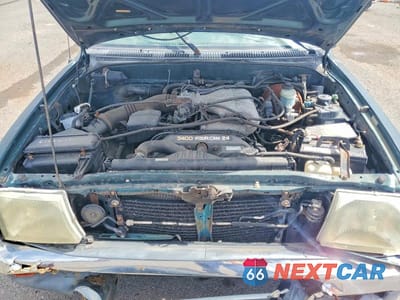 Zdjęcie 11 z 12 samochodu: 1999 TOYOTA TACOMA XTRACAB VIN:4TAVN52N0XZ402311 - miniatura