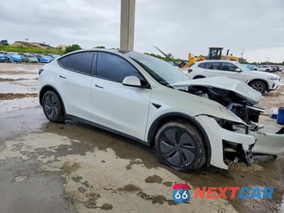 Czwarte zdjęcie samochodu z boku: 2026 TESLA MODEL Y VIN:7SAYGDEE2TA458851 - miniatura