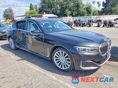 Czwarte zdjęcie samochodu z boku: 2022 BMW 740 XI VIN:WBA7T4C09NCK50834 - miniatura