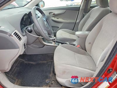 Zdjęcie 7 z 12 samochodu: 2009 TOYOTA COROLLA LE VIN:JTDBL40E59J009934 - miniatura