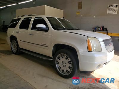 Czwarte zdjęcie samochodu z boku: 2009 GMC YUKON DENALI VIN:1GKFK03219R270319 - miniatura