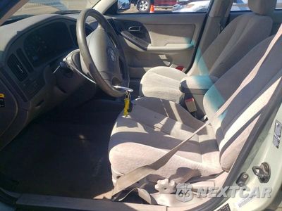 Zdjęcie 7 z 12 samochodu: 2004 HYUNDAI ELANTRA GLS VIN:KMHDN46D24U743693 - miniatura