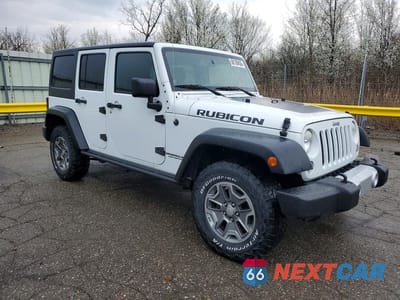 Czwarte zdjęcie samochodu z boku: 2014 JEEP WRANGLER UNLIMITED RUBICON VIN:1C4BJWFG4EL234905 - miniatura