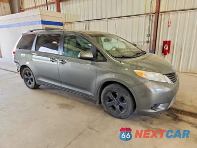 Czwarte zdjęcie samochodu z boku: 2011 TOYOTA SIENNA LE VIN:5TDKK3DC8BS060245 - miniatura