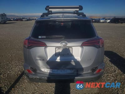 Zdjęcie 6 z 13 samochodu: 2018 TOYOTA RAV4 XLE VIN:JTMWFREV8JD128112 - miniatura