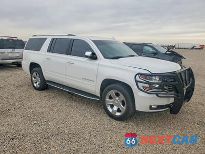 Czwarte zdjęcie samochodu z boku: 2020 CHEVROLET SUBURBAN K1500 PREMIER VIN:1GNSKJKC0LR174092 - miniatura