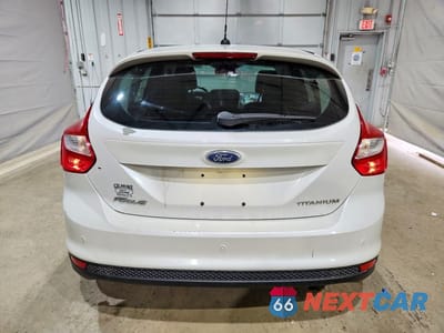 Zdjęcie 6 z 11 samochodu: 2012 FORD FOCUS TITANIUM VIN:1FAHP3N25CL144954 - miniatura