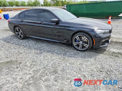 Czwarte zdjęcie samochodu z boku: 2019 BMW 740 I VIN:WBA7E2C56KB218015 - miniatura