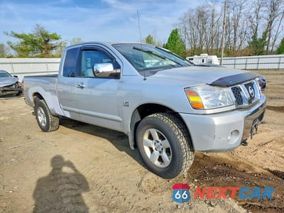 Czwarte zdjęcie samochodu z boku: 2004 NISSAN TITAN XE VIN:1N6AA06B54N535700 - miniatura