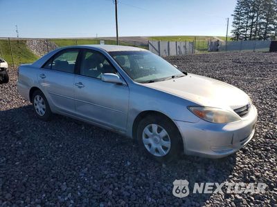Czwarte zdjęcie samochodu z boku: 2003 TOYOTA CAMRY LE VIN:4T1BE32K33U737213 - miniatura