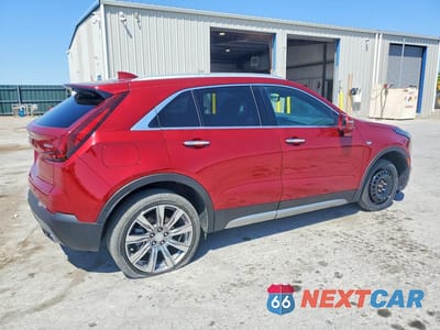 Trzecie zdjęcie samochodu z tyłu: 2019 CADILLAC XT4 PREMIUM LUXURY VIN:1GYFZCR48KF117813 - miniatura