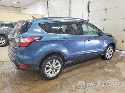 Trzecie zdjęcie samochodu z tyłu: 2018 FORD ESCAPE SE VIN:1FMCU9GD0JUC04057 - miniatura