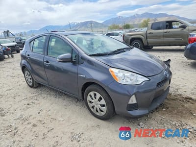 Czwarte zdjęcie samochodu z boku: 2014 TOYOTA PRIUS C ONE VIN:JTDKDTB37E1076399 - miniatura