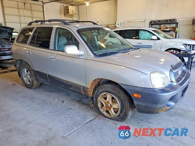 Czwarte zdjęcie samochodu z boku: 2003 HYUNDAI SANTA FE GLS VIN:KM8SC13E33U534115 - miniatura