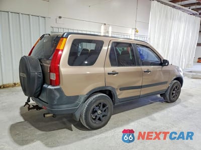 Trzecie zdjęcie samochodu z tyłu: 2002 HONDA CR-V LX VIN:JHLRD78452C069928 - miniatura