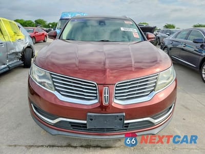 Piąte zdjęcie samochodu w środku: 2016 LINCOLN MKX RESERVE VIN:2LMTJ6LR3GBL54028 - miniatura