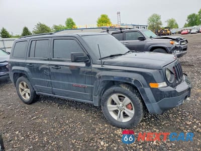 Czwarte zdjęcie samochodu z boku: 2014 JEEP PATRIOT LATITUDE VIN:1C4NJRFBXED532873 - miniatura