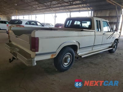 Trzecie zdjęcie samochodu z tyłu: 1986 FORD F250 VIN:1FTHX2518GKA61770 - miniatura