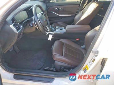 Zdjęcie 7 z 12 samochodu: 2021 BMW 330E VIN:3MW5P7J09M8B83996 - miniatura