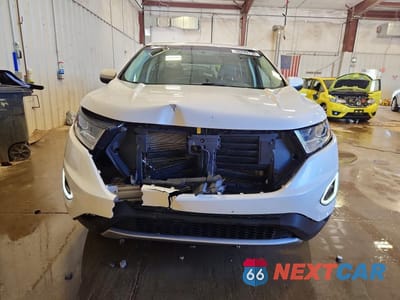 Piąte zdjęcie samochodu w środku: 2018 FORD EDGE TITANIUM VIN:2FMPK4K98JBB44810 - miniatura