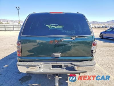 Zdjęcie 6 z 14 samochodu: 2003 CHEVROLET TAHOE C1500 VIN:1GNEC13ZX3J274129 - miniatura