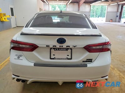 Zdjęcie 6 z 12 samochodu: 2022 TOYOTA CAMRY HYBRID XSE VIN:4T1K31AK0NU033257 - miniatura
