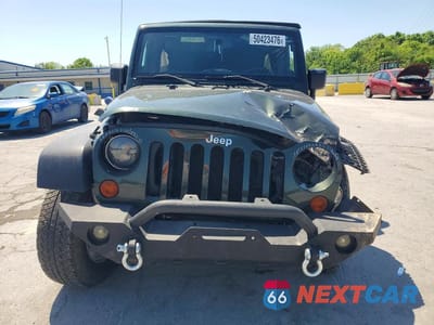 Piąte zdjęcie samochodu w środku: 2011 JEEP WRANGLER UNLIMITED SPORT VIN:1J4BA3H16BL630248 - miniatura