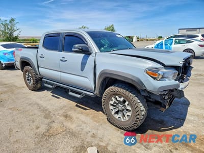 Czwarte zdjęcie samochodu z boku: 2018 TOYOTA TACOMA TRD OFF-ROAD VIN:3TMCZ5AN2JM184642 - miniatura
