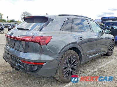 Trzecie zdjęcie samochodu z tyłu: 2024 AUDI Q8 E-TRON PRESTIGE VIN:WA16AAGE5RB024093 - miniatura