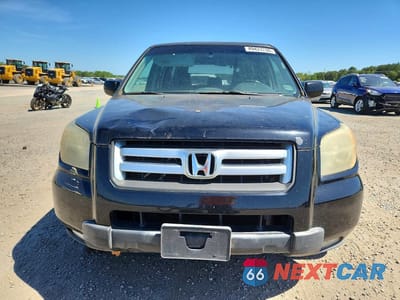 Piąte zdjęcie samochodu w środku: 2006 HONDA PILOT EX VIN:2HKYF18506H564721 - miniatura