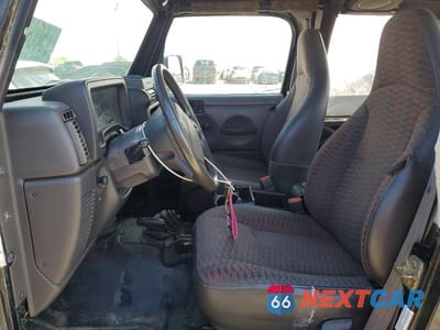 Zdjęcie 7 z 12 samochodu: 2000 JEEP WRANGLER / TJ SE VIN:1J4FA29P5YP702511 - miniatura