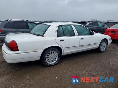 Trzecie zdjęcie samochodu z tyłu: 2010 MERCURY GRAND MARQUIS VIN:2MEBM7FV6AX630115 - miniatura
