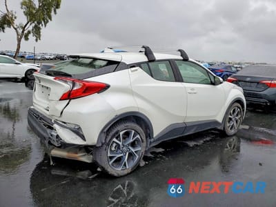 Trzecie zdjęcie samochodu z tyłu: 2021 TOYOTA C-HR XLE VIN:JTNKHMBX1M1115883 - miniatura