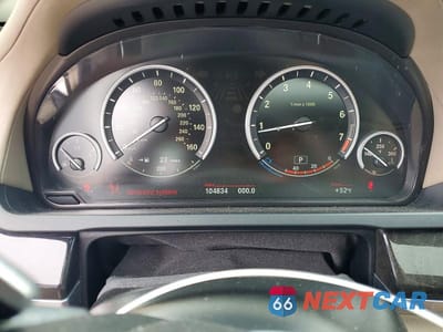 Zdjęcie 9 z 12 samochodu: 2013 BMW 750 LI VIN:WBAYE8C57DD133456 - miniatura
