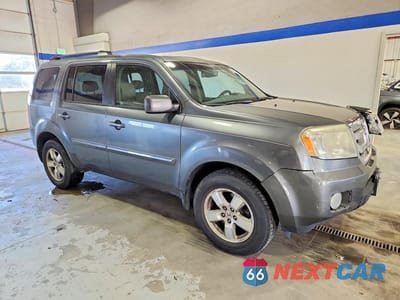 Czwarte zdjęcie samochodu z boku: 2011 HONDA PILOT EXL VIN:5FNYF4H50BB026935 - miniatura