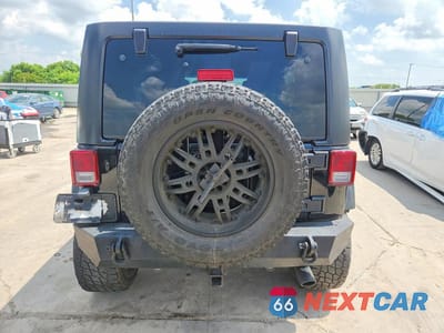 Zdjęcie 6 z 12 samochodu: 2014 JEEP WRANGLER UNLIMITED SAHARA VIN:1C4BJWEG9EL100473 - miniatura