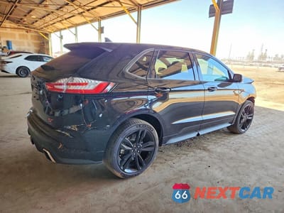 Trzecie zdjęcie samochodu z tyłu: 2021 FORD EDGE ST VIN:2FMPK4AP5MBA28372 - miniatura
