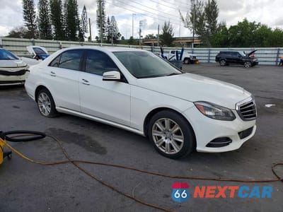 Czwarte zdjęcie samochodu z boku: 2014 MERCEDES-BENZ E 250 BLUETEC VIN:WDDHF0EB7EA900381 - miniatura