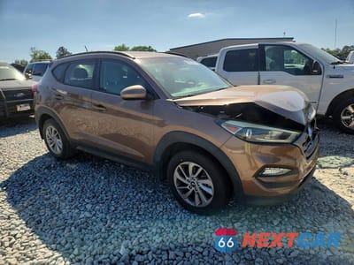 Czwarte zdjęcie samochodu z boku: 2016 HYUNDAI TUCSON SE VIN:KM8J33A42GU109590 - miniatura