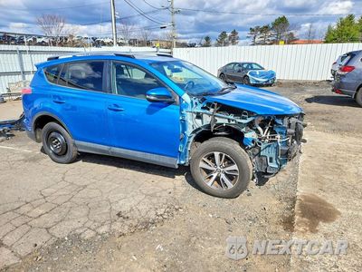 Czwarte zdjęcie samochodu z boku: 2016 TOYOTA RAV4 XLE VIN:JTMWFREV8GD087456 - miniatura