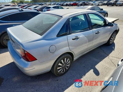 Trzecie zdjęcie samochodu z tyłu: 2007 FORD FOCUS ZX4 VIN:1FAFP34NX7W211040 - miniatura