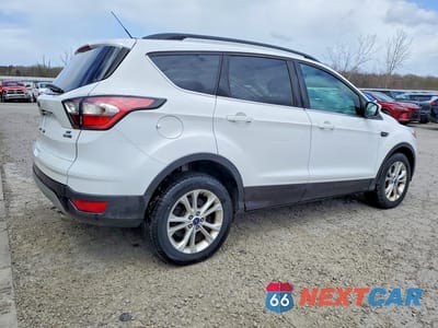 Trzecie zdjęcie samochodu z tyłu: 2017 FORD ESCAPE SE VIN:1FMCU9GDXHUA37328 - miniatura