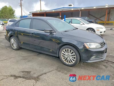 Czwarte zdjęcie samochodu z boku: 2015 VOLKSWAGEN JETTA SE VIN:3VWD07AJ0FM354458 - miniatura