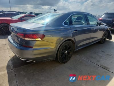 Trzecie zdjęcie samochodu z tyłu: 2021 VOLKSWAGEN PASSAT SE VIN:1VWSA7A33MC014189 - miniatura
