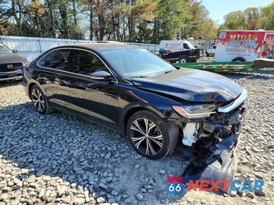 Czwarte zdjęcie samochodu z boku: 2021 VOLKSWAGEN PASSAT SE VIN:1VWSA7A33MC015553 - miniatura