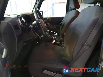 Zdjęcie 7 z 14 samochodu: 2015 JEEP WRANGLER UNLIMITED SPORT VIN:1C4BJWDG6FL586243 - miniatura