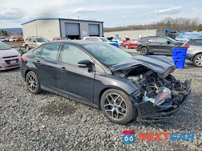 Czwarte zdjęcie samochodu z boku: 2017 FORD FOCUS SEL VIN:1FADP3H28HL207868 - miniatura