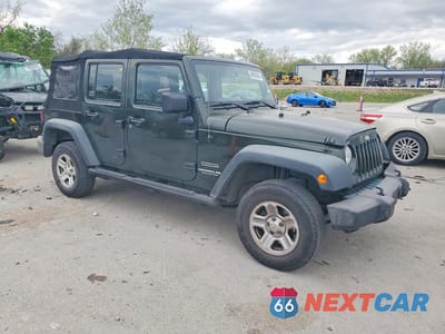 Czwarte zdjęcie samochodu z boku: 2010 JEEP WRANGLER UNLIMITED SPORT VIN:1J4BA3H11AL121067 - miniatura